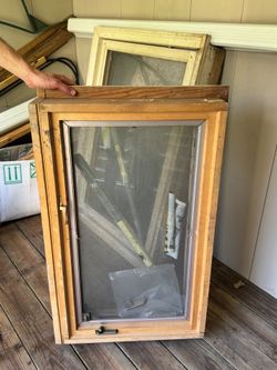2 Pella wooden casement windows with built in blinds