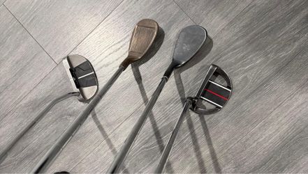 2 Putters - 1 Sand wedge - 1  TW 60 degree
