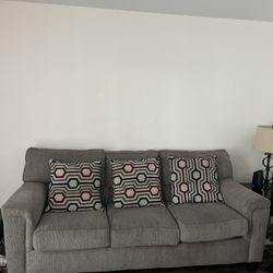 Two Gray Couches / Sofas with 4 Pillows 