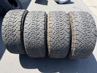 (4) 37x13.50R22 Venom Power Terra Hunter Tires