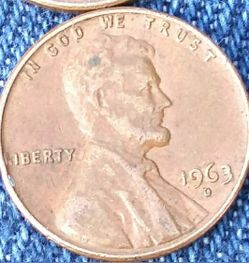 1963 D penny with crooked Letters from liberty,and numbers