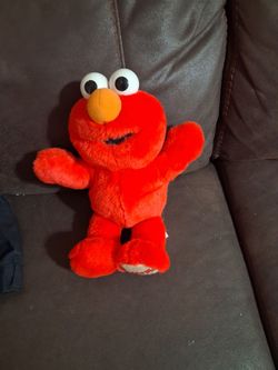 Tickle me elmo an it talk in good condition