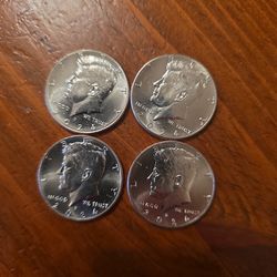 4 2024 uncirculated Kennedy half dollar coins