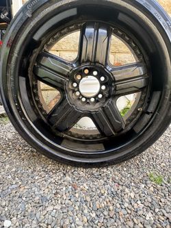 Continental 245/35 R20 Tires with Black 5-Spoke Wheels