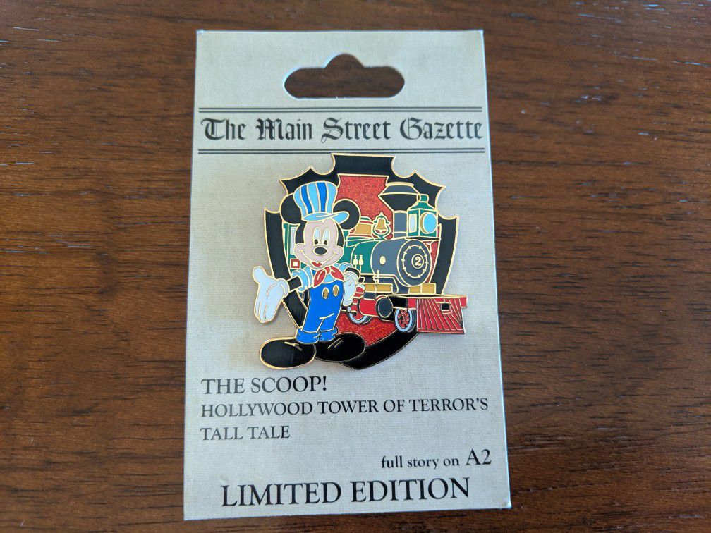 Disney LE 1500 pin the main Street gazette with Mickey and the railroad
