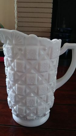 Milk glass pitcher....Vintage... Beautiful!. Tall. 8 1/4 inches.. Diameter. 5 inches