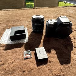 Canon rebel SL3 with kit lens & 128GB memory card