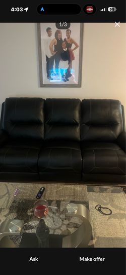 Black couch with recliners