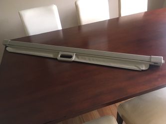 Tan cargo cover for some SUVs