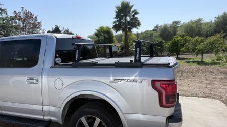 RetraxPro XR cover with T-Slots, Yakima Outpost HD with 68” HD crossbars.