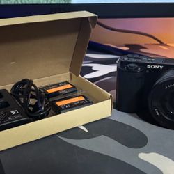 Sony Alpha ZV-E10 Mirrorless Camera w/ 16-50mm Lens with 2 batteries and charger