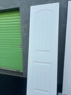 White Interior Door Panel with Arch Detail