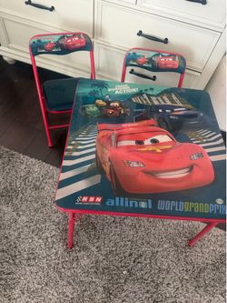 Disney cars table and two chairs.  $25