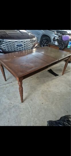 Brown table no chairs