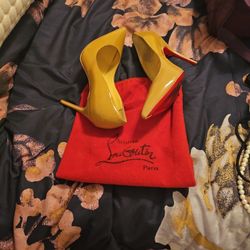 Red Leather  Christian LOUBOUTIN 