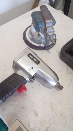 2.6 gallon . Compressor And Husky air tools