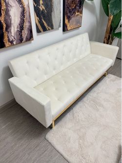 Cream Colored Sofa and Bed