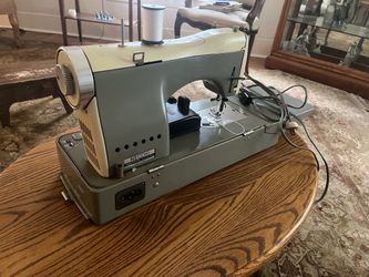 Necchi Vintage sewing machine with case and accessories