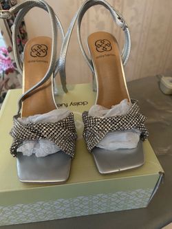 Silver heels size 8 1/2.  Only worn twice.  Very nice for wedding or prom.