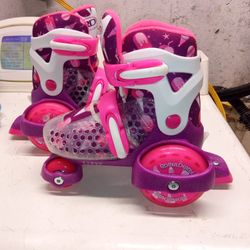 Size 11 -3 Adjustable Size Skates 
