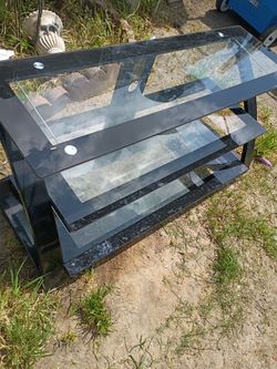 Tv entertainment stand with 3 glass tiers