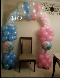 Reveal balloons arch