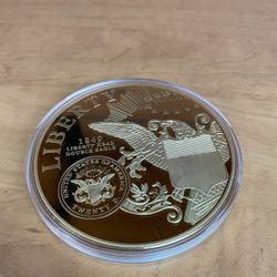 jumbo coin" of the 1849 Liberty Head Double Eagle, layered in 24k gold, produced by the American Mint