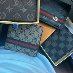 Gucci, Louis Vuitton wallets 