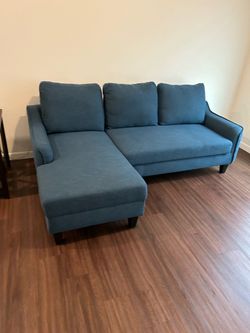 Beautiful  Teal Colored couch and chase!😊