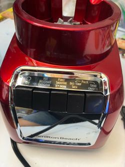 Red Hamilton  beach blender. Used once missing attachment.