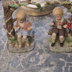 Boy And Girl Porcelain Figures Swing On A Tree