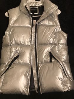 Women’s Silver puffer vest size medium