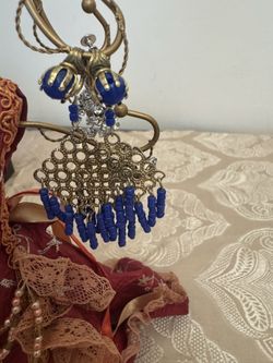 Assortment of earrings and silver