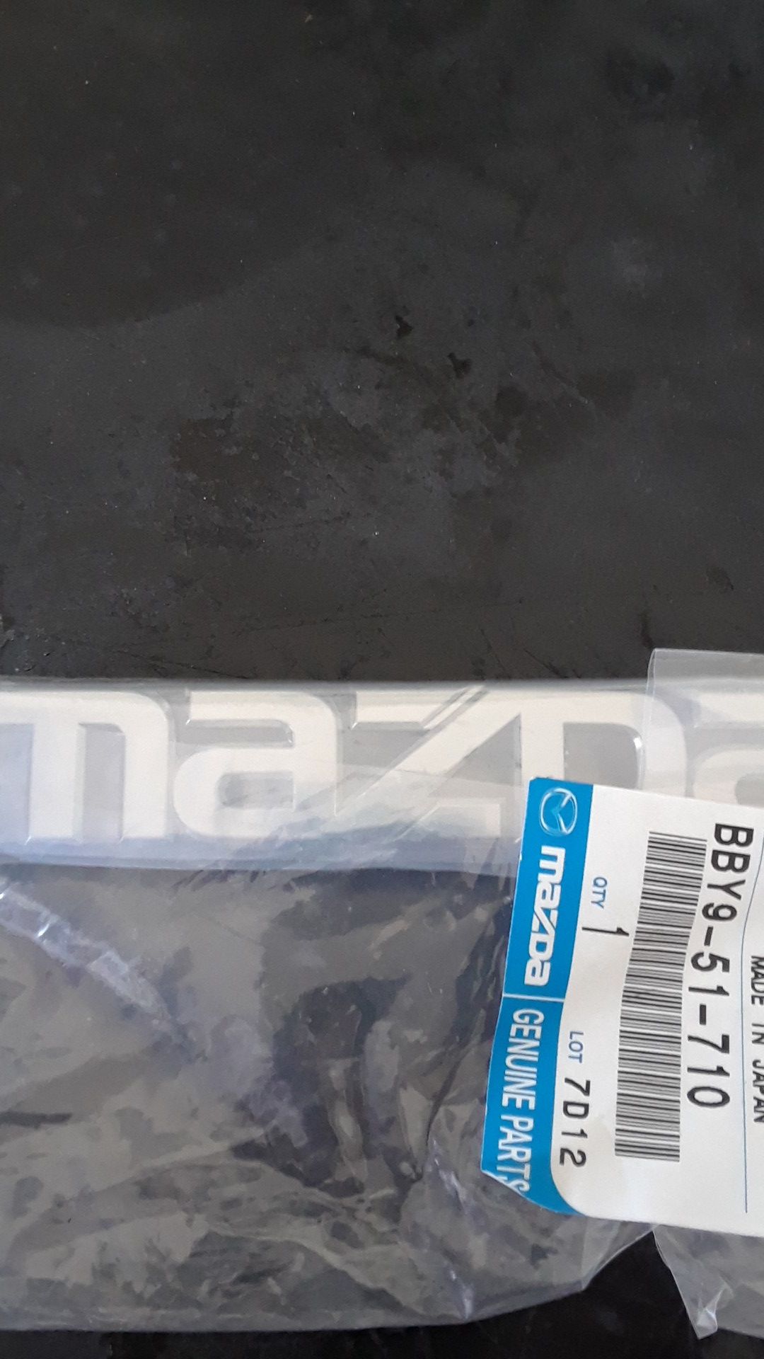 Mazda name emblem 3