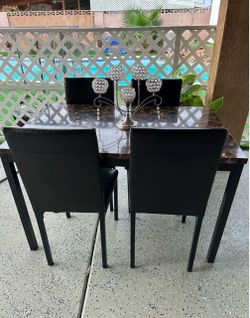 Marble dining tables with four chairs,