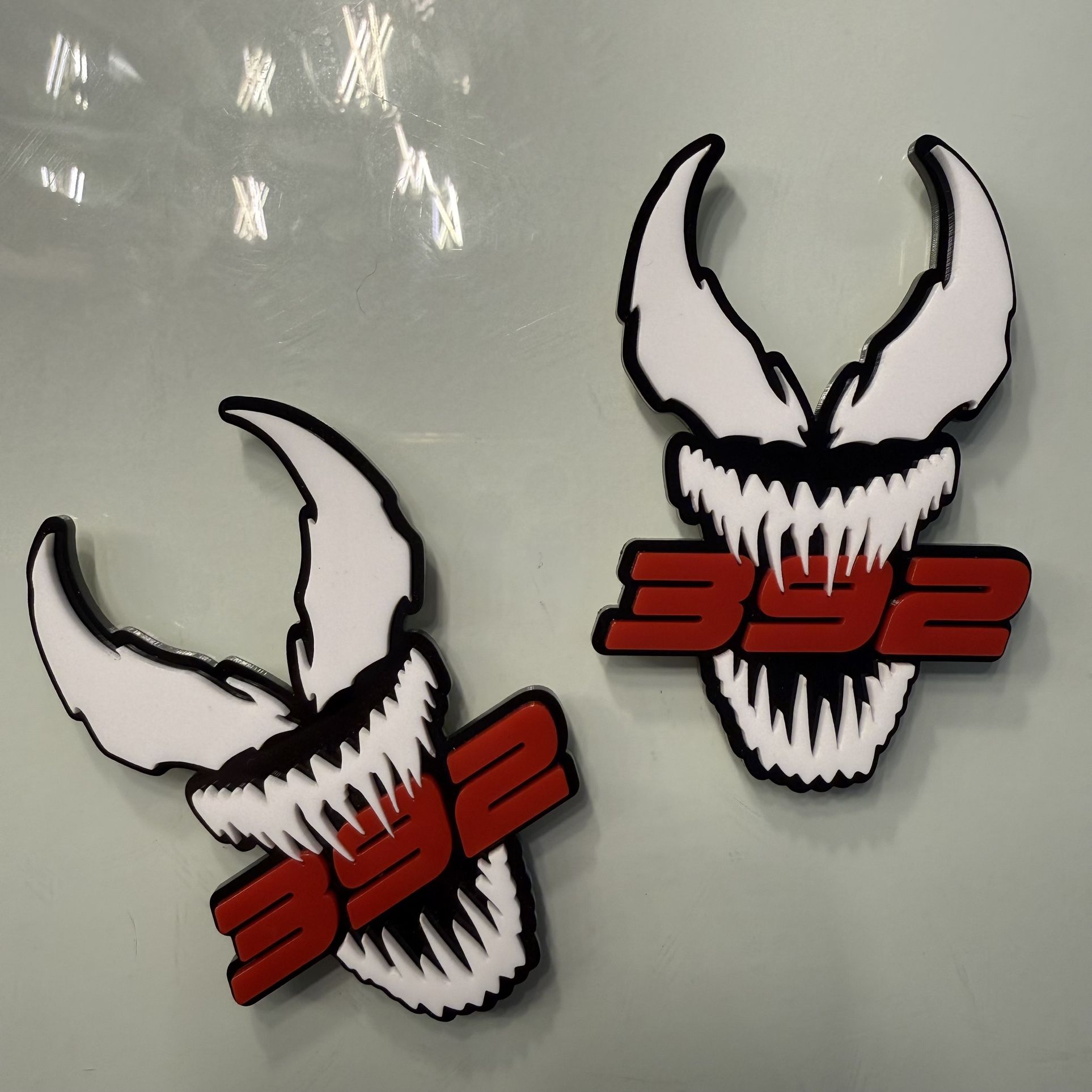 White Eye With Red Venom Fender Badges