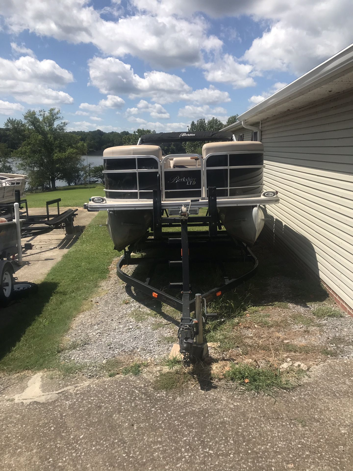 2012 Berkshire pontoon and trailer 4 stroke