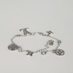 Luxury Style Silver Bracelet With A Flower Cutouts &Crystal Accents  7.5"