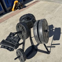 100 Pound Weight Plates/rack/20 Pound weight Vest 