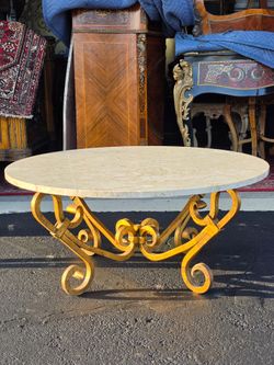 Vintage Mid-Century Hollywood Regency Masterpiece coffee table. Genuine Heavy Marble Top. Heavy Cast iron base.