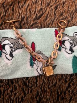 Michael Kors gold brackets