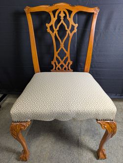 Ornate Carved Wood Dining Chair with Geometric Upholstery