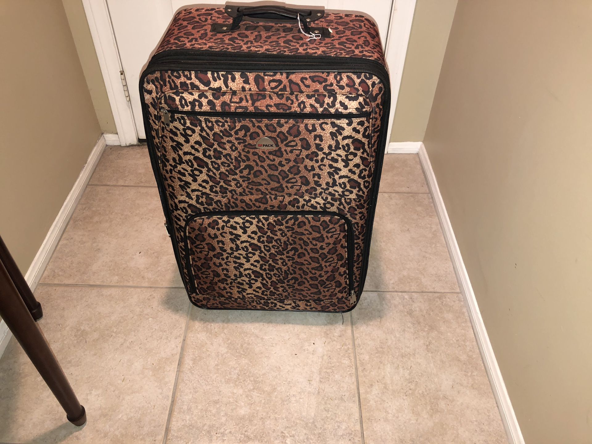 Leopard print suitcase