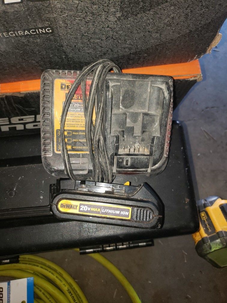 Used Dewalt 12-20volt Charger,Battery,and Impact I Haven't Yet Taken A Picture Of