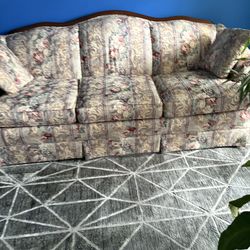 3 Cushion Floral pattern sofa with wood trim
