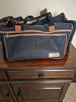 20x12 structured soft carry size bag, lots of pockets like new 10.00