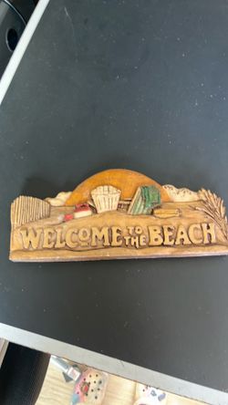 Vintage welcome to the beach sign