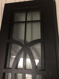 beautiful iron door color black with elegant decoration the price for this door its 1900 its very nice I have To sale because its the wrong size