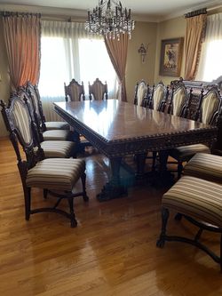 Ornate Dark Wood Dining Table and Chair Set