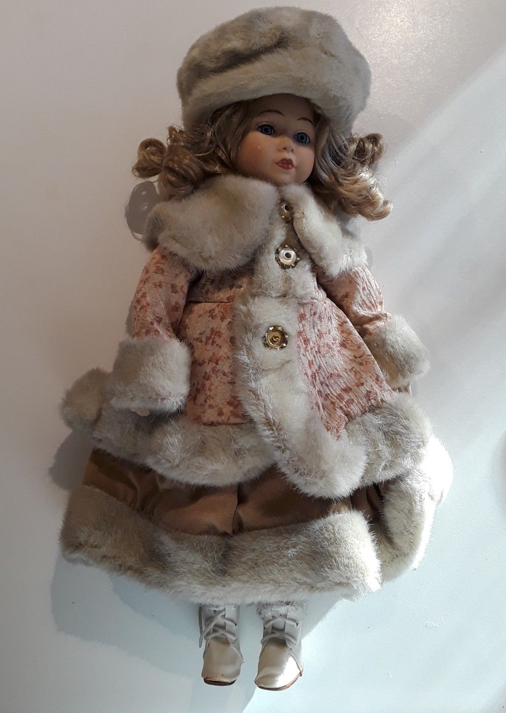 Antique collectible cloth doll with porcelain head hands and feet 16 in tall